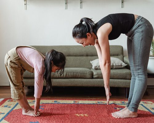 mom-and-daughter-exercising