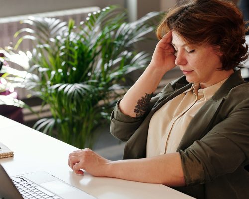 tired-woman-at-desk